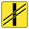 T-7 tabliczka wskazująca układ torów i drogi na przejeździe